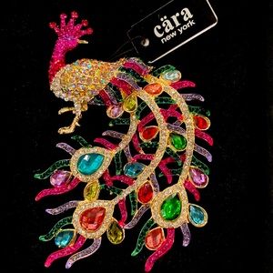 Cara designer Peacock brooch